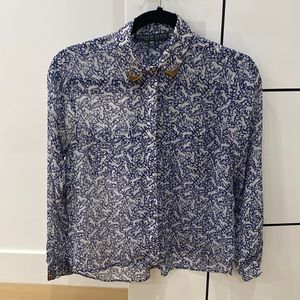 Blue and white flowy blouse